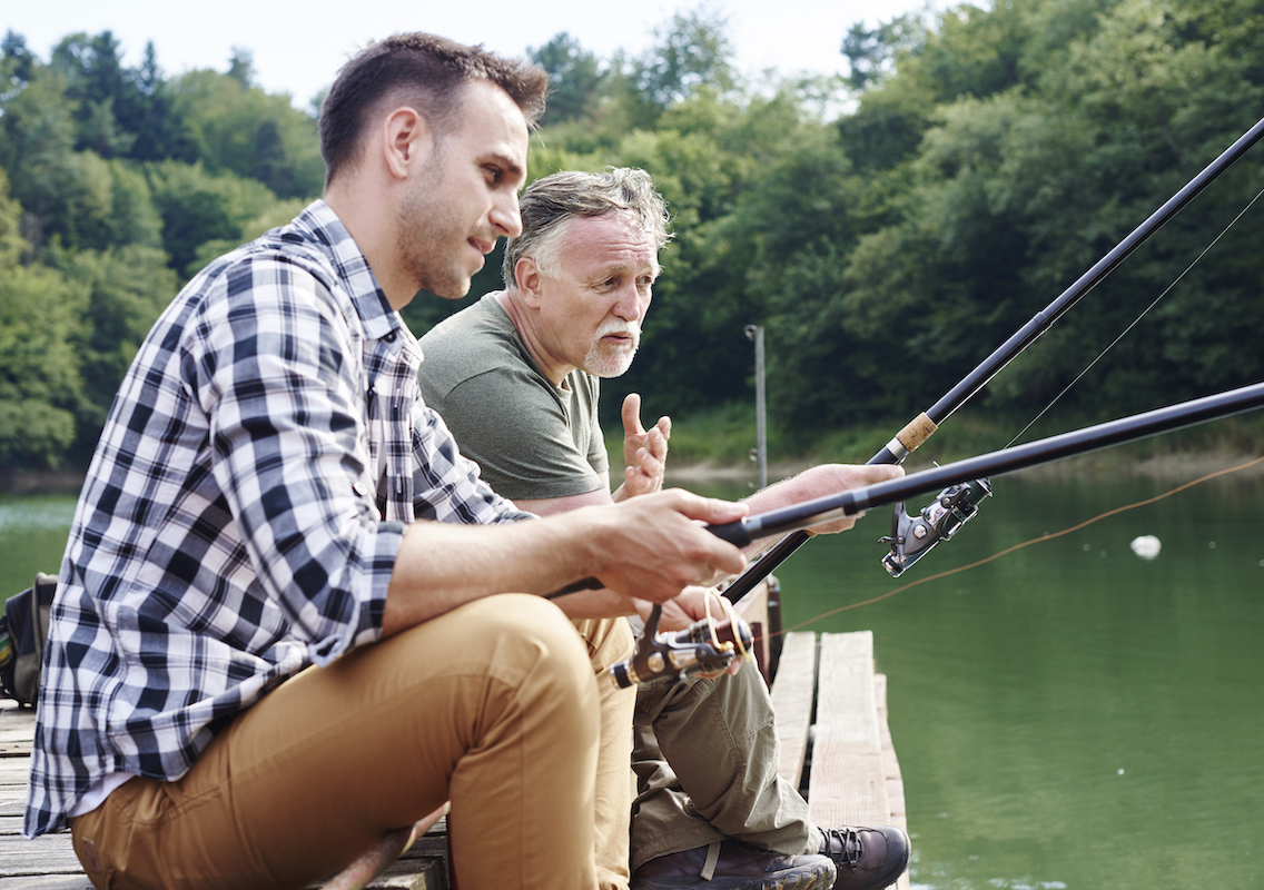 Men talking and fishing together
